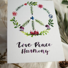 Weihnachts-Postkarte „Love Peace Harmony“